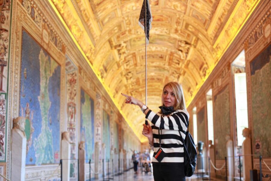 Rome: Vatican Museum and Sistine Chapel Group Tour in German - Vatican Museums highlights: Gallery of Maps, Raphaelian rooms, and more