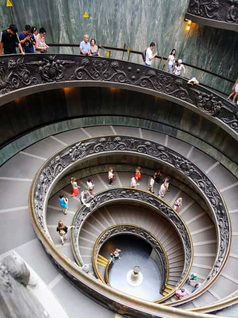 Vatican City: Vatican Museum and Sistine Chapel Guided Tours - Galleries of art, ancient statues, and a modern sculpture courtyard